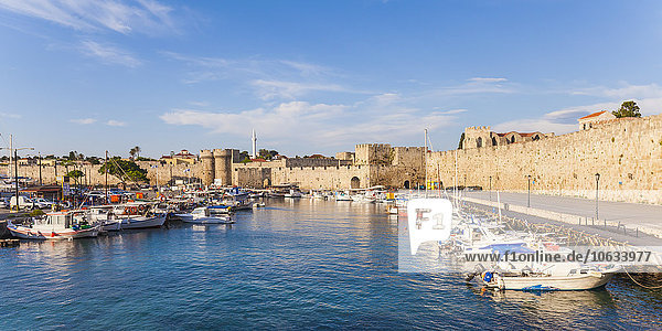 Greece  Rhodes  harbor  city wall and fishing boats