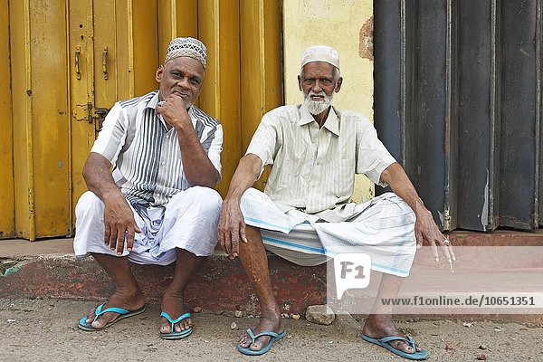 Religious Muslims with caps and white beards  Pettah  Colombo  Sri Lanka  Asia