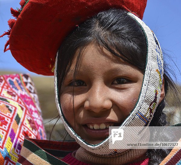 Indigenous girl in traditional costume portrait Cusco Peru South America