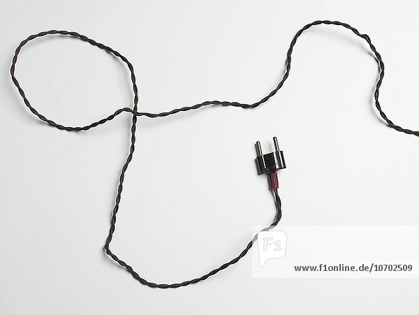 Still life of power plug with white background.