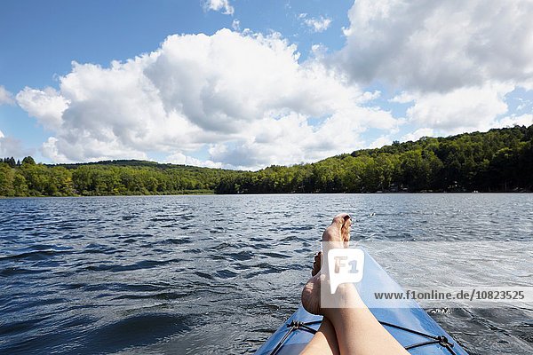 Feet up on canoe  New Milford  Pennsylvania  US