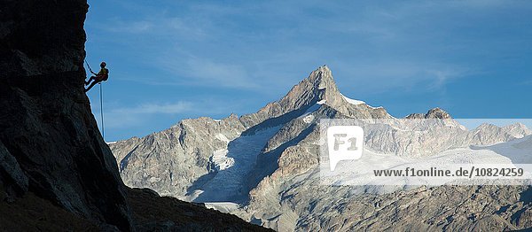 Kletterer auf Felswand,  Mont Blanc,  Frankreich