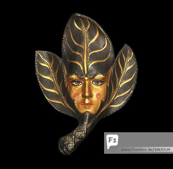 Finstere venezianische Maske mit goldenem Gesicht und Blättern auf schwarzem Hintergrund
