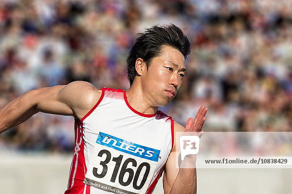 Japanischer Sprinter auf der Bahn