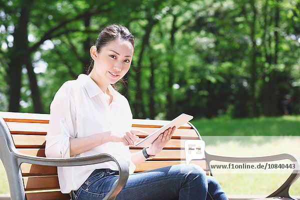 Japanese attractive woman in a city park