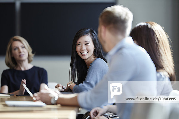 Smiling businesswoman in meeting