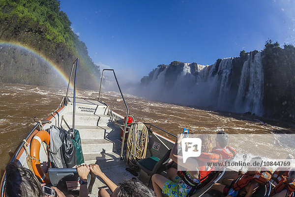 Tourists take a river boat to the base of the falls  Iguazu Falls National Park  UNESCO World Heritage Site  Misiones  Argentina  South America