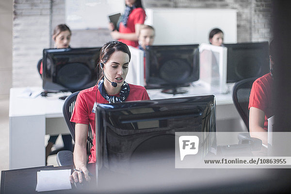 Rows of female telephonists working in call centre