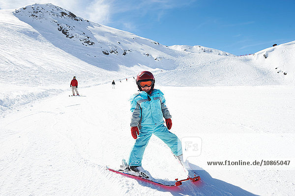 Portrait of young boy on skis