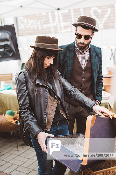 Young couple browsing at market