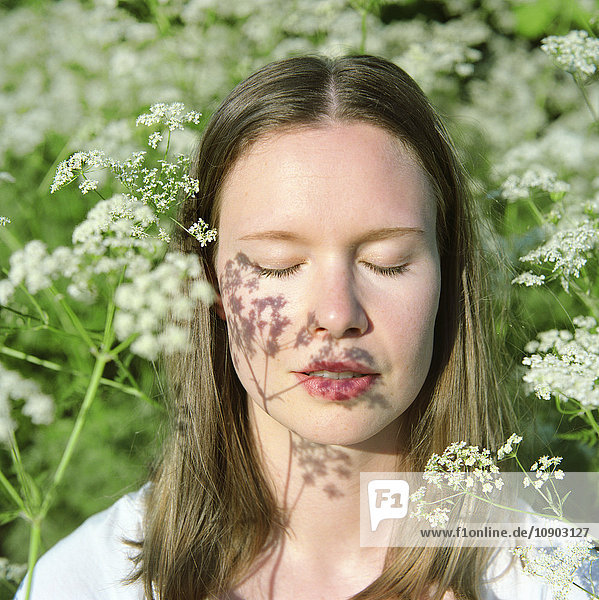 Finland Portrait of young woman with closed eyes