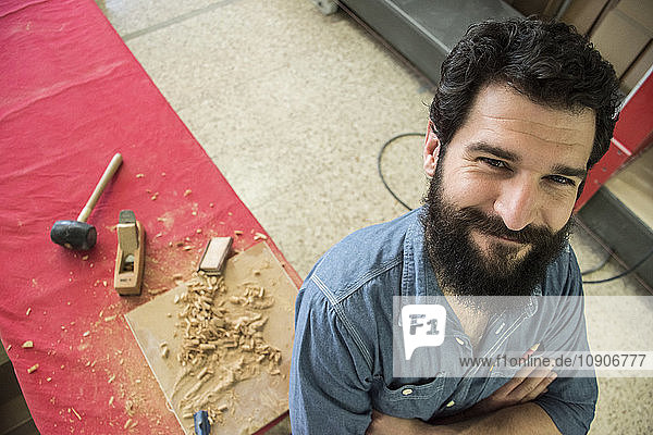 Portrait of carpenter smiling