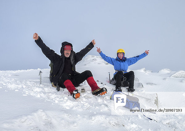 UK  Scotland  Glencoe  Beinn a'Bheithir  mountaineering in winter  two climbers