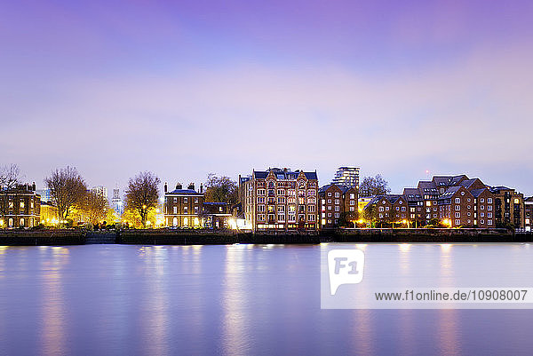UK  London  houses at River Thames at blue hour