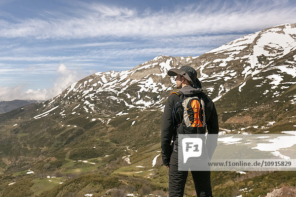 Spain  Asturias  Somiedo  man hiking in mountains