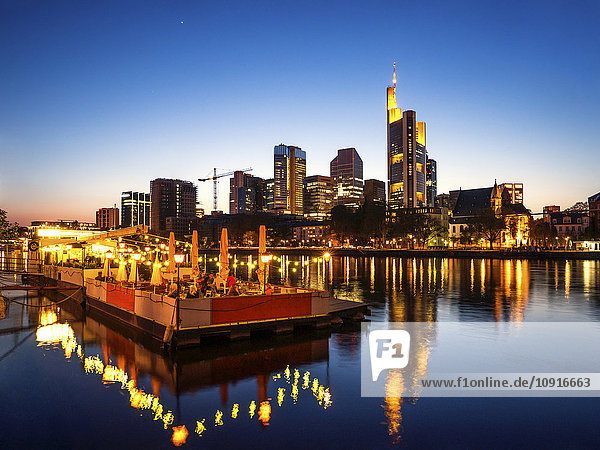 Germany  Frankfurt  skyline with platform on River Main in the evening