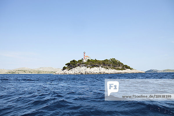 Lighthouse on island in Adriatic Sea