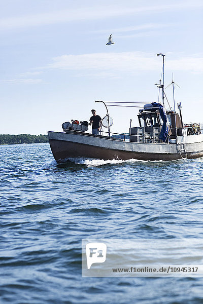 Sweden  Stockholm archipelago  fishing boat on sea