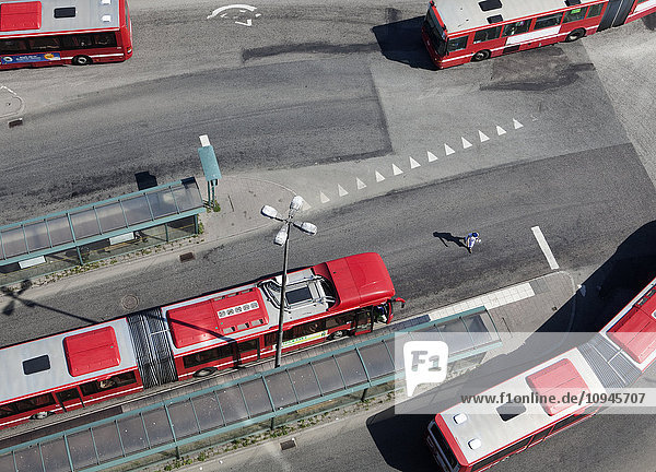 Red and white buses as seen from above
