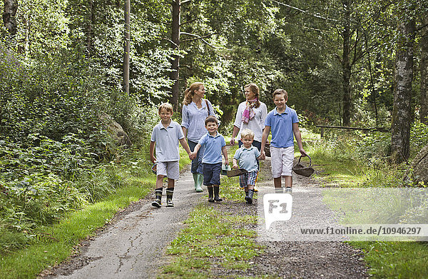 Family walking through road