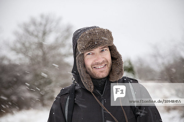 Smiling man at winter