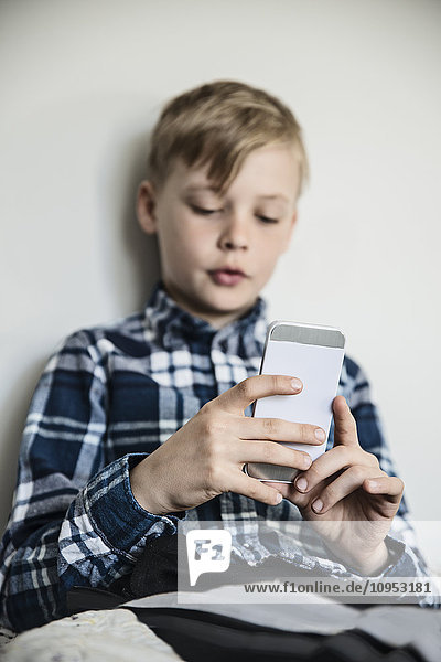 Boy using cell phone