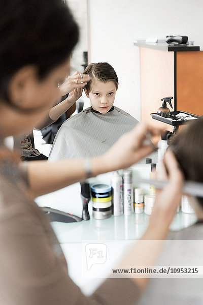 Boy at hairdresser
