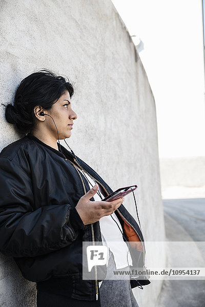 Mid adult woman with cell phone