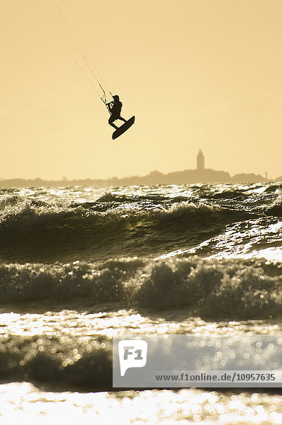 One person kite-surfing  Sweden.