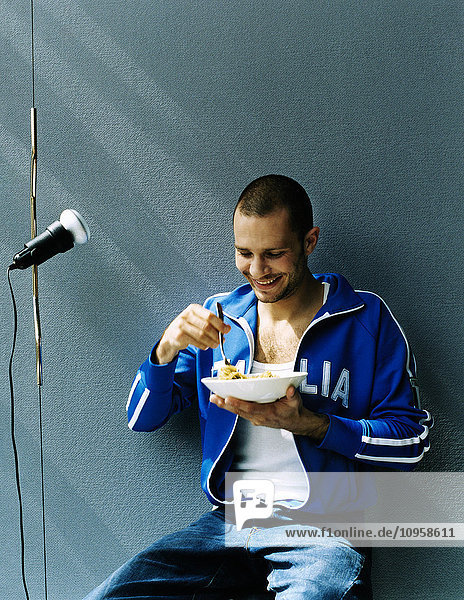 Man eating spaghetti  Sweden.