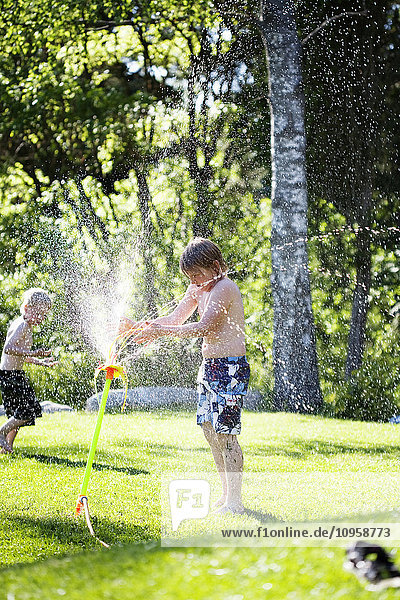 Children playing in the garden  Sweden.