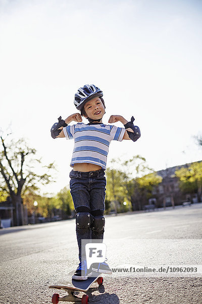 'Young boy riding a skateboard; Montreal  Quebec  Canada'