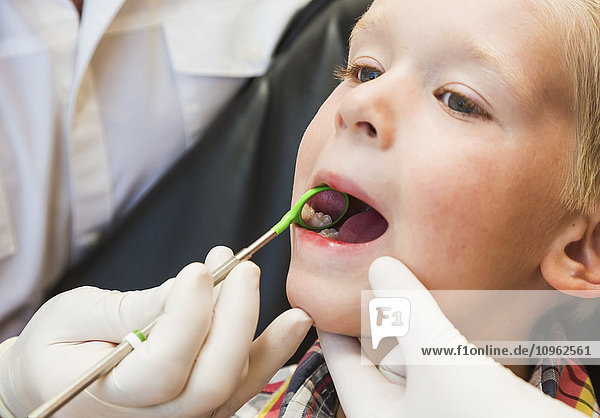 'A young boy at a dental examination; Edmonton  Alberta  Canada'