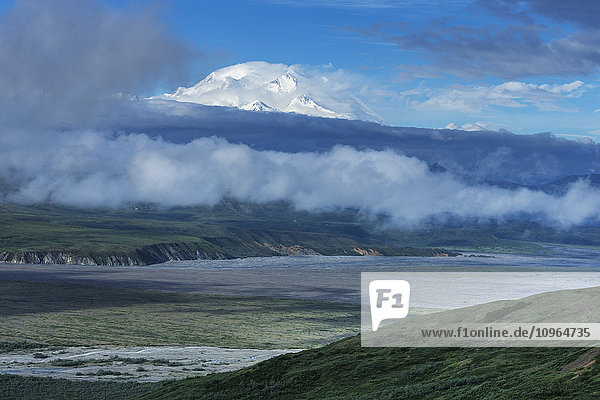 'Denali emerges from morning mist as seen from Eielson Visitor Center  Denali National Park; Alaska  United States of America'
