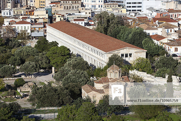 'Long building's rooftop in a cityscape; Athens  Greece'