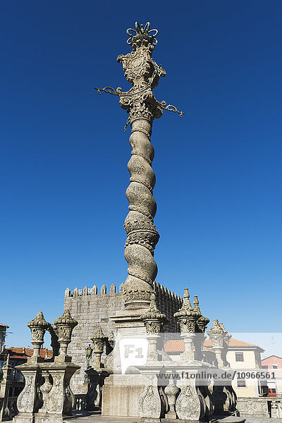 'Column monument against a blue sky; Oporto  Portugal'
