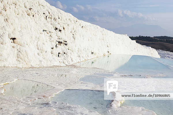 'Hot springs and travertines terraces of carbonate minerals left by the flowing water; Pamukkale Turkey'