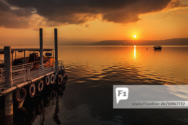 'A calm settles on the Sea of Galilee  just after a storm; Galilee  Israel'