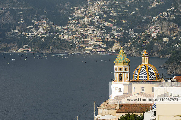 'Ornate dome and bell tower along the Amalfi coast; Praiano  Campania  Italy'