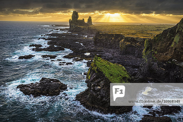 'The sea stack known as Londranger rises above the landscape Snaefellsnes Peninsula; Iceland'