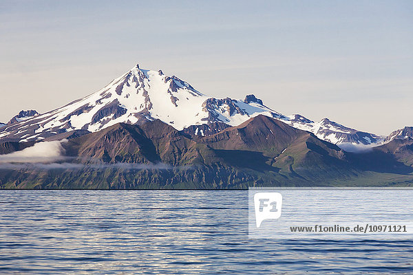 'Frosty Peak Volcano On The Alaska Peninsula In Summertime; Southwest Alaska  United States Of America'