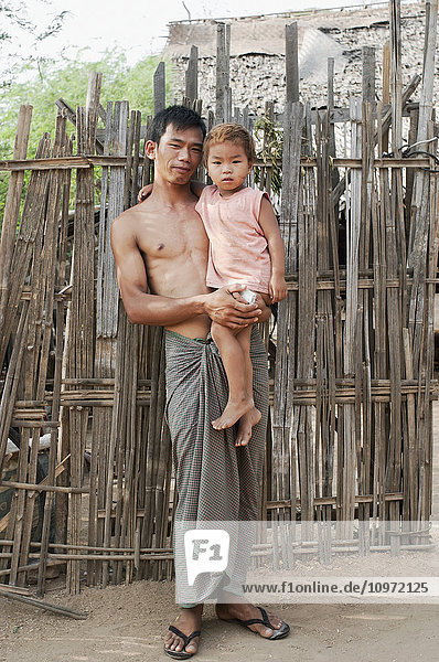 'Portrait of a father and a daughter; Bagan  Myanmar'