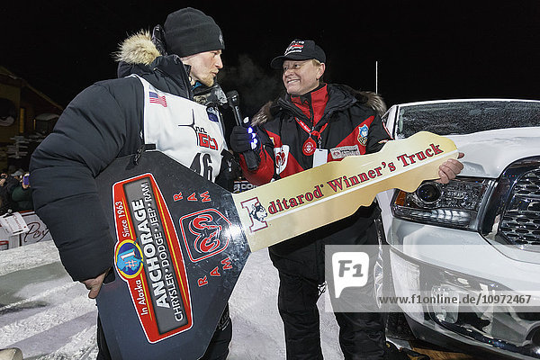 Dallas Seavey recieves the key to his new Dodge truck after winning the 2015 Iditarod  Nome  Alaska