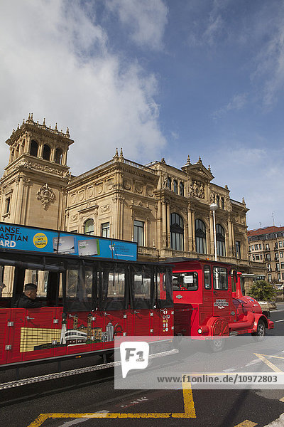 'Teatro Victoria Eugenia theatre with a tourist tour bus in front; San Sebastian  Spain'
