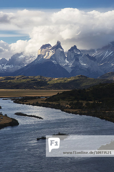 'Cuernos del Paine towering above Rio Grey  Torres del Paine National Park; Magallanes region  Chile'