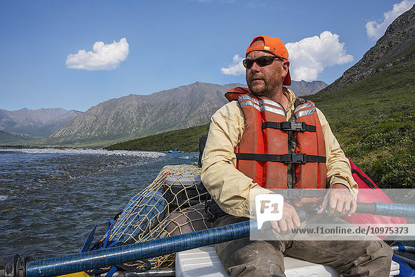 Rafter on the Marsh Fork of the Canning River  ANWR  Arctic Alaska  summer