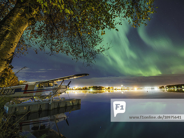 Northern Lights (Aurora Borealis) light up the sky over Lake Hood  Anchorage  Southcentral Alaska