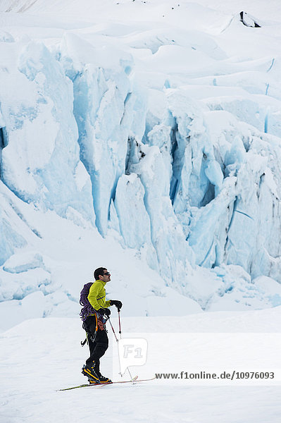 Jeff Benowitz skiing in front of Portage Glacier  Southcentral Alaska  Winter