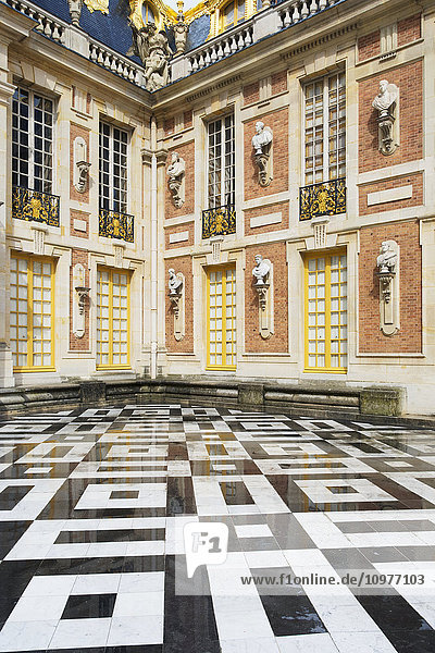 'Chateau de Versailles  entrance courtyard with black and white tiled floor; Versailles  France'