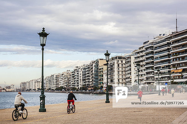 'Pedestrians and cyclists along the waterfront; Thessaloniki  Greece'